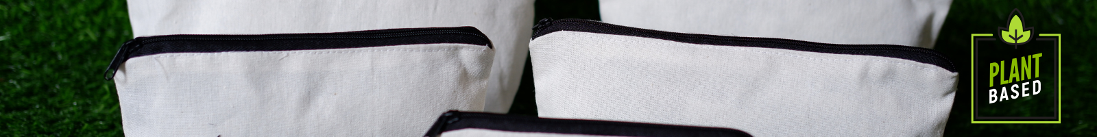 toiletry bags made with washable paper with plantbased logo beside