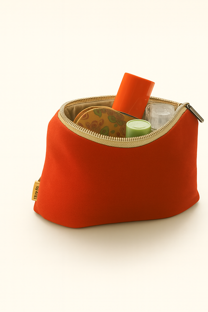 ESME toiletry bag in red with internal contents